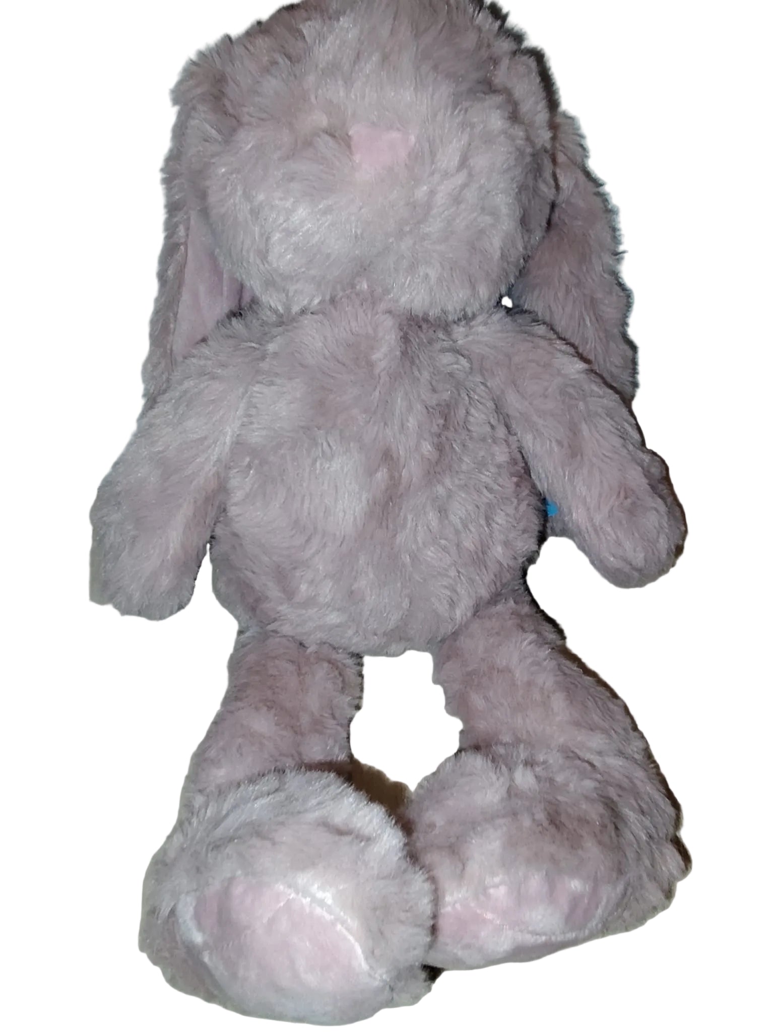 Peluche grand modèle Lapin de L'Atelier de Lolo, douce et moelleuse, avec longues oreilles et pelage blanc.